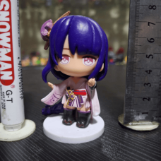 Chibi-style collectible figures inspired by characters from the video game Genshin Impact