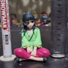 Collectible figure of Maomao from the anime series The Apothecary Diaries, featuring a cute and detailed design that captures her charming appearance.