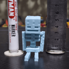 Small 3D-printed articulated Skeleton figure inspired by the game Minecraft, designed as a fun collectible or display piece.