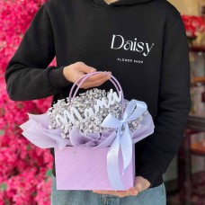 A scattered flower box wrapped in elegant paper