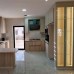 ﻿Spanish Laminate Wood Kitchen with Quartz Countertop