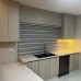 ﻿Spanish Laminate Wood Kitchen with Quartz Countertop