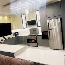 ﻿Spanish Laminate Wood Kitchen with Quartz Countertop
