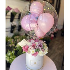 Flower arrangement with balloons