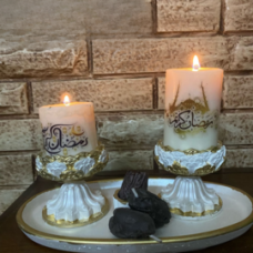 Two Ramadan candles, three dates, with a base for the candles and dates, and a tray.